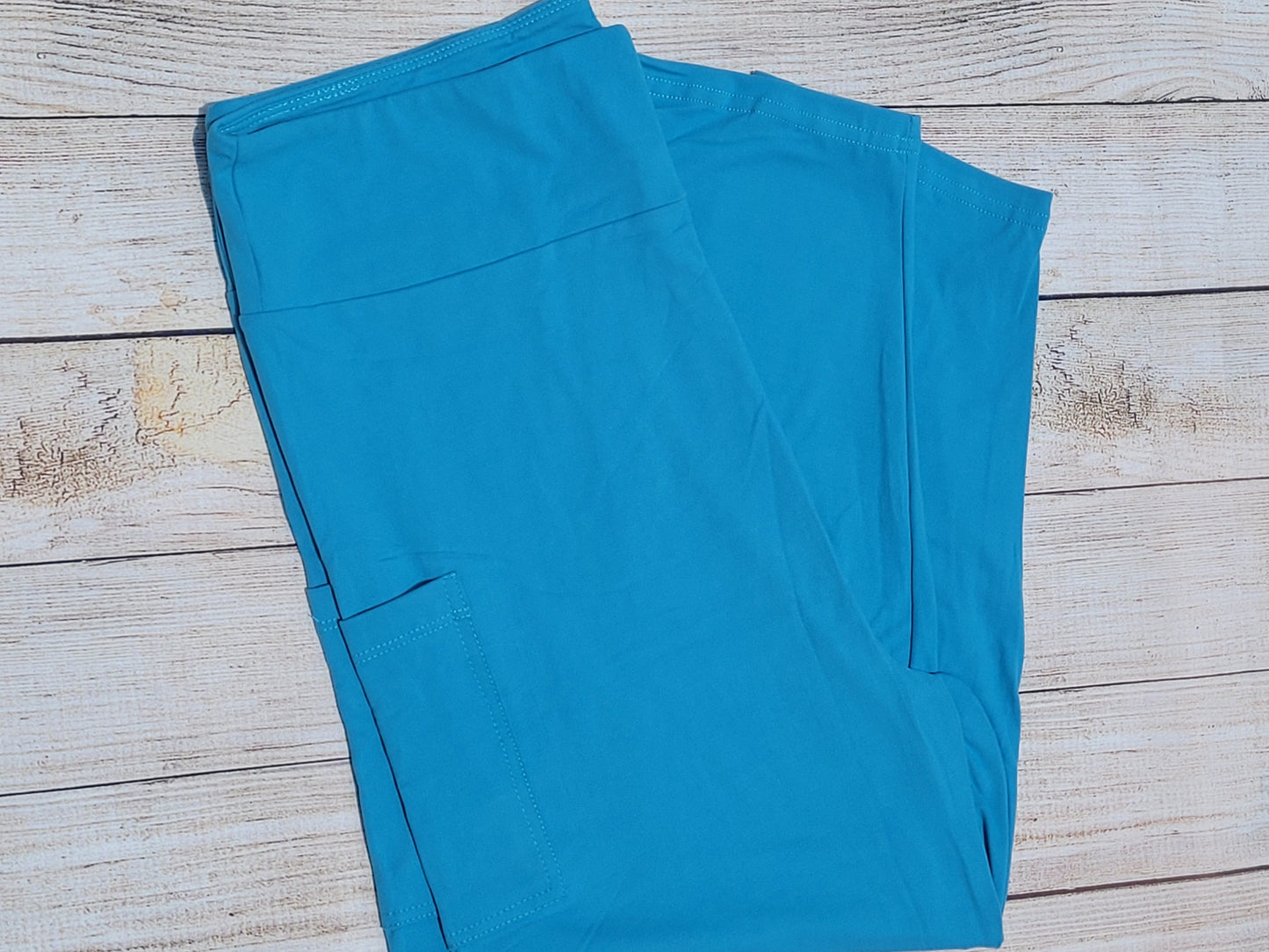 Aqua Blue capris and biker shorts with pockets