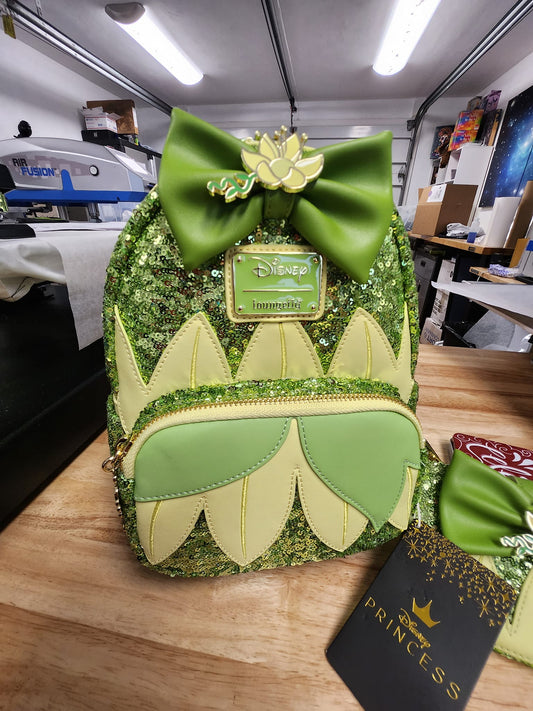 LOUNGEFLY TIANA SEQUIN GLOW SET (BACKPACK AND WALLET)