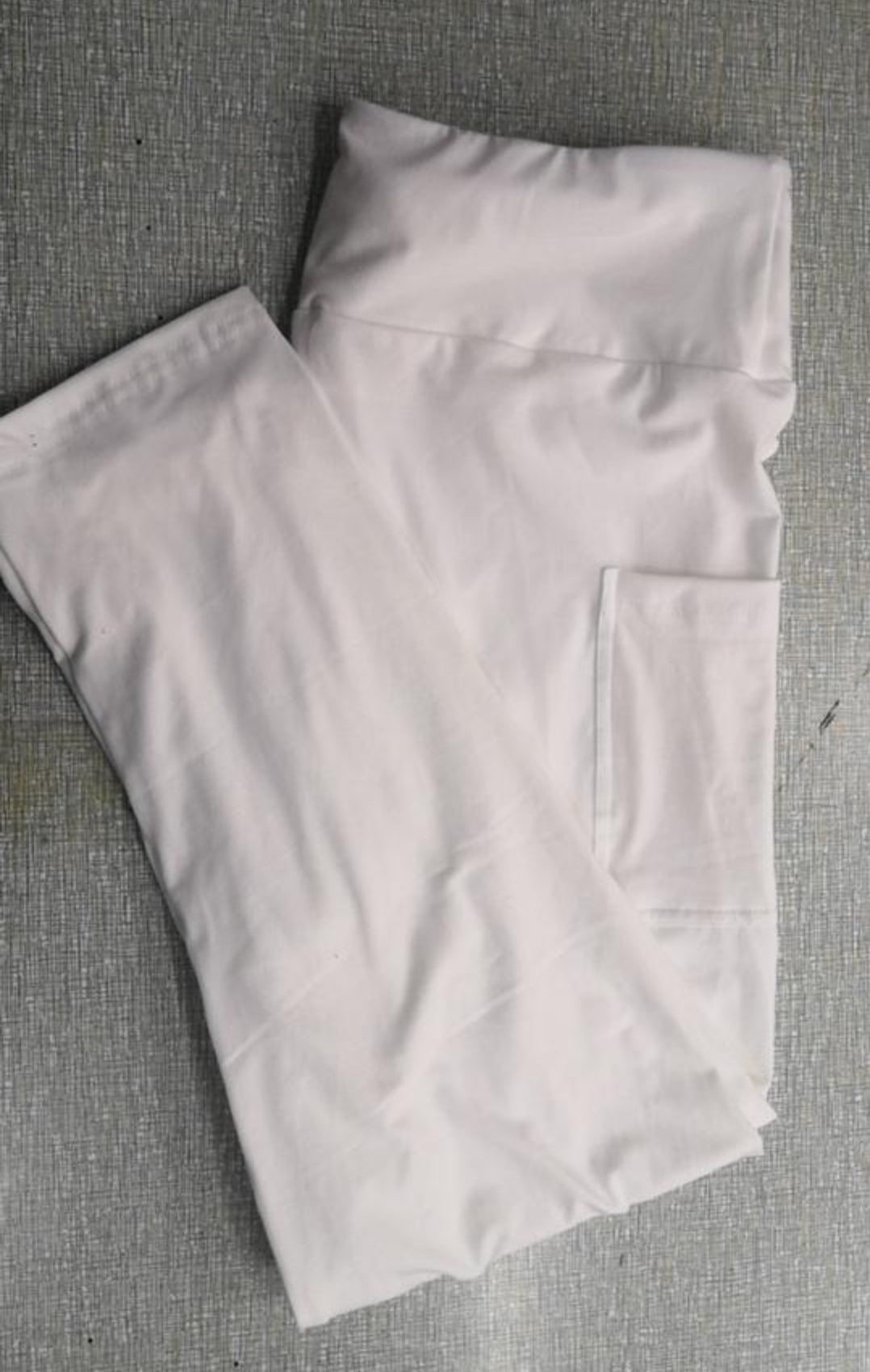 White cream leggings, capris, and biker shorts with pockets