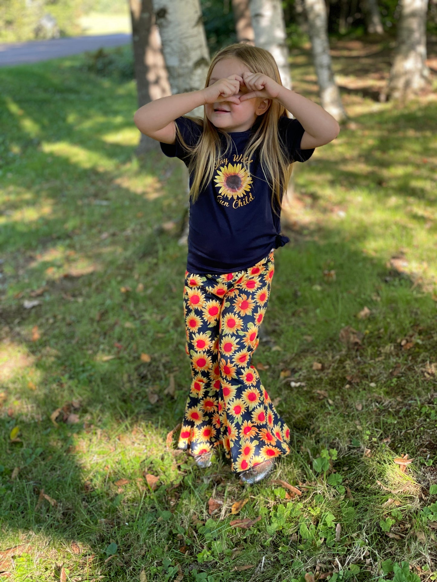 Stay Wild Sun Child Sunflower Graphic Tee and Bell Pants